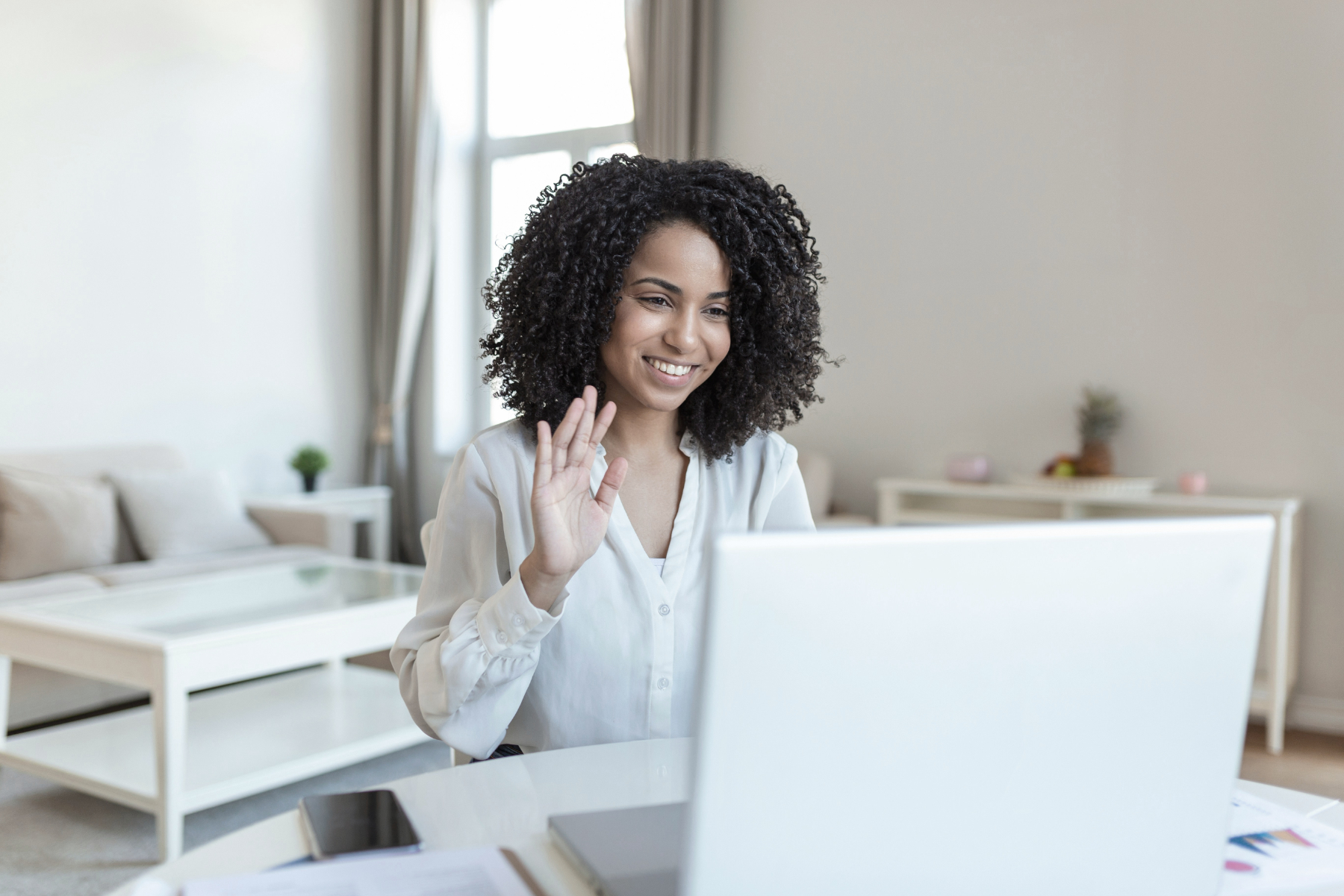 Women smiling at a computer screen on GloballyHired the Contingent W2 staffing platform