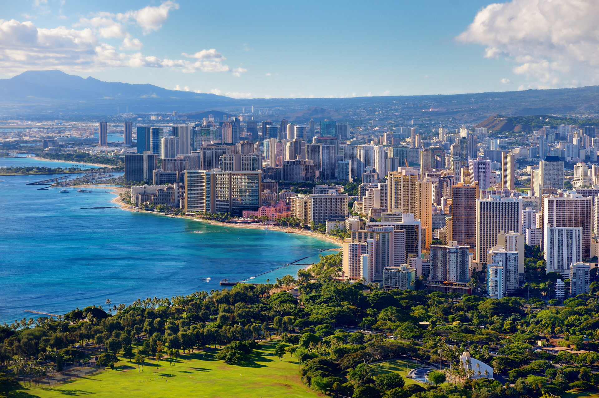 Honolulu staffing agency homepage image of the city and the beach and blue skies