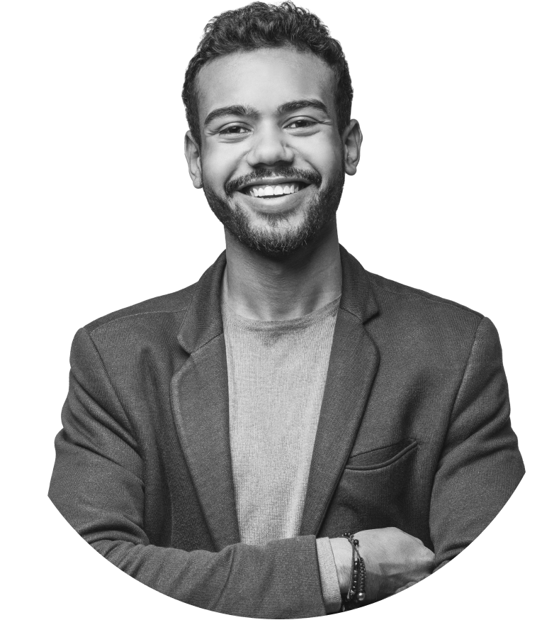 Man who is a temp agency worker smiling wearing a suit with arms folded can be seen