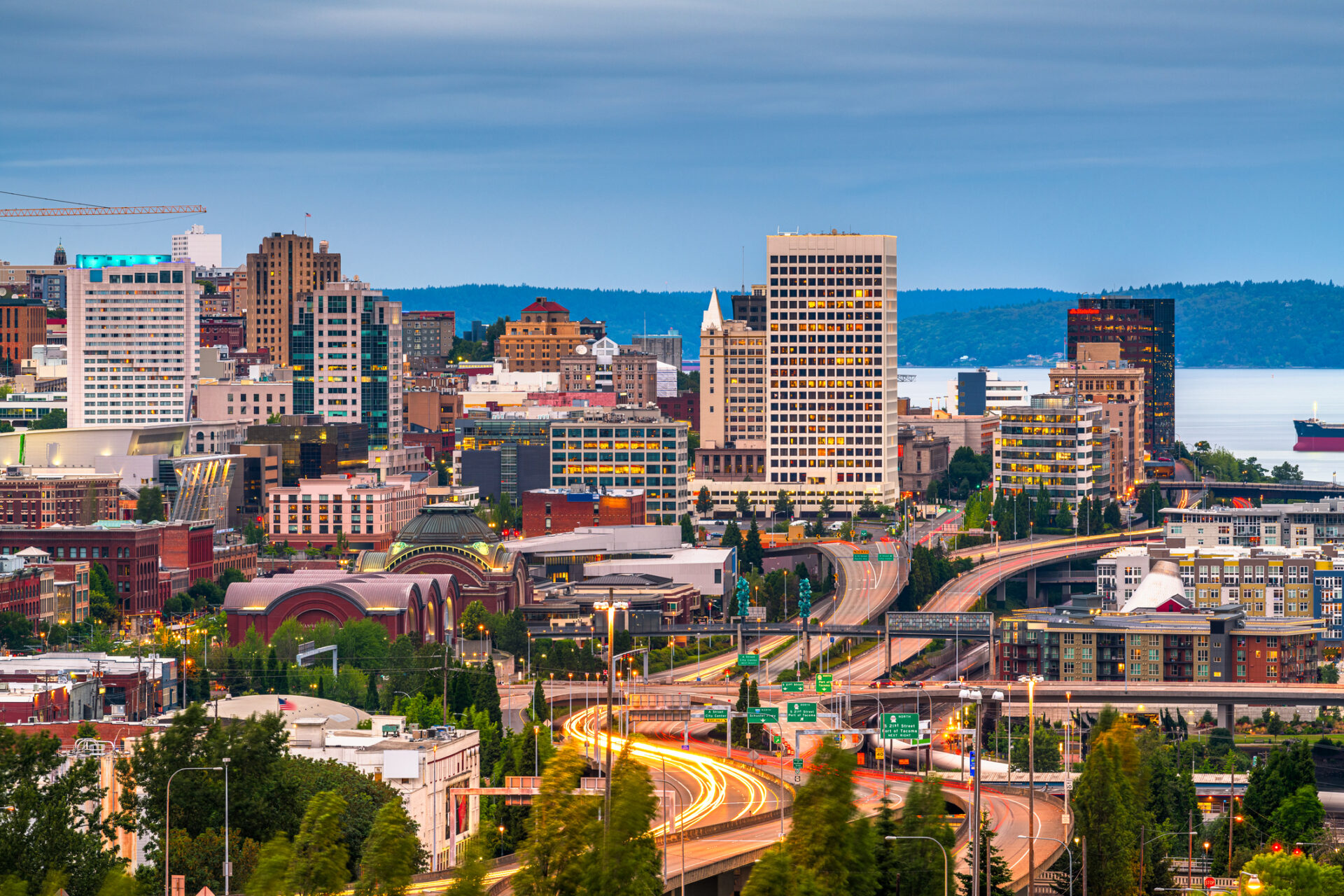 Tacoma Washington Scion Staffing Homepage Image of Tacoma in the evening the lights of freeway can be seen from above